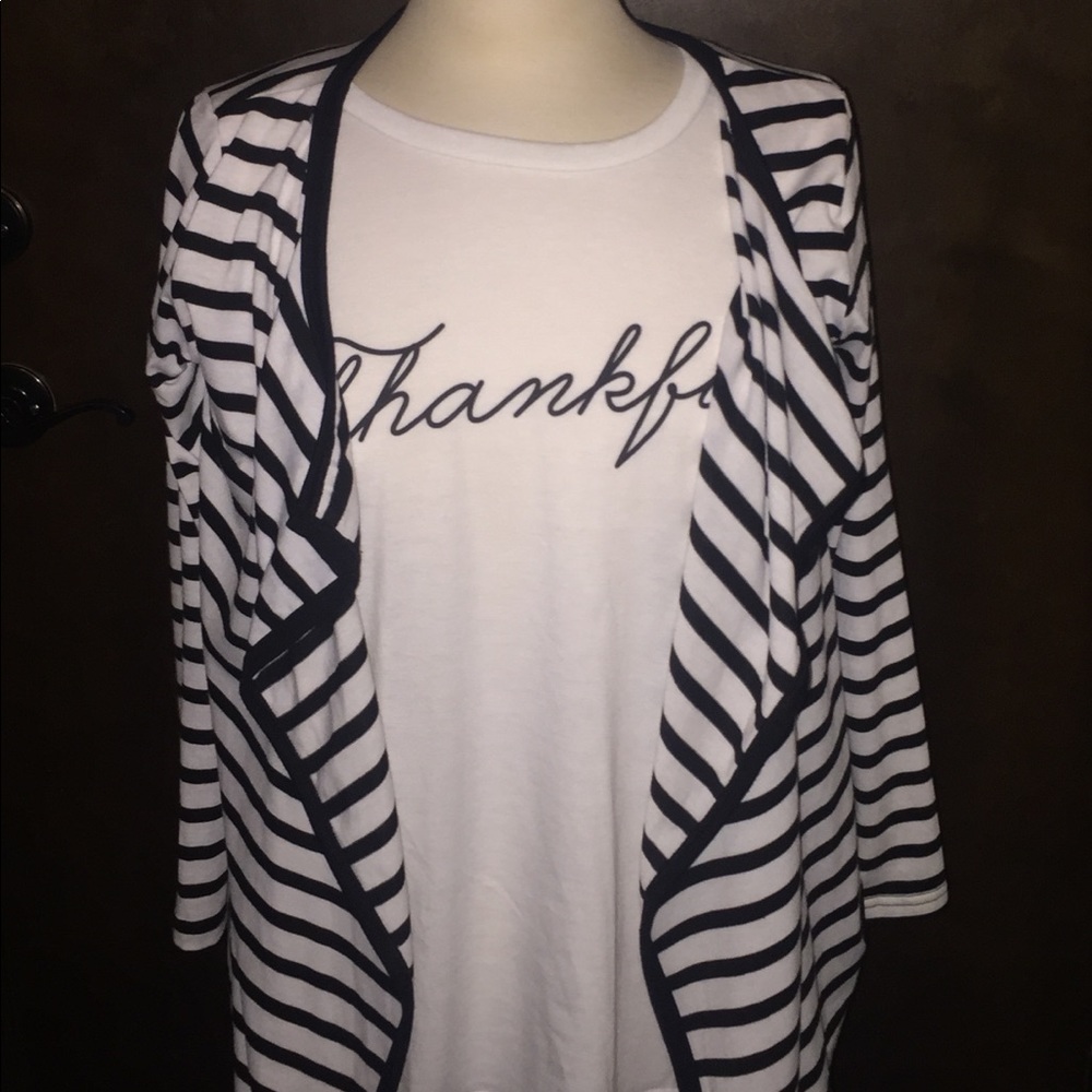 Blk & Wht strip jacket w/ Thankful shirt.